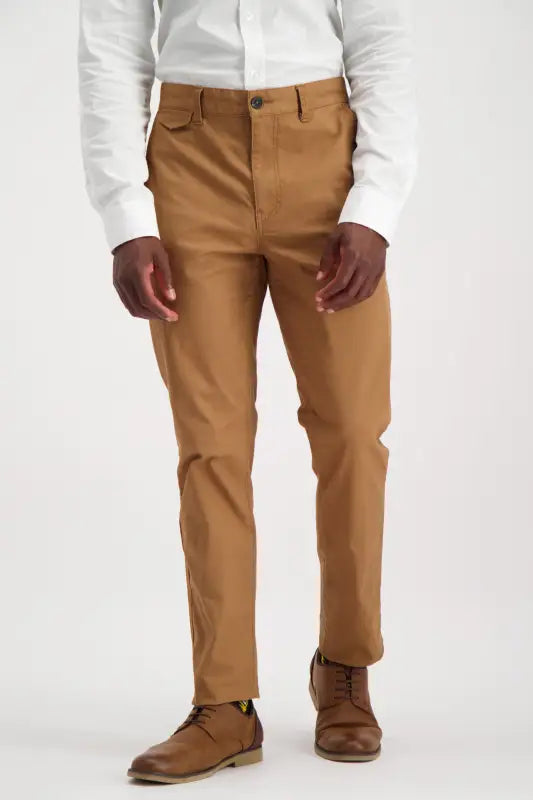 Men’s slim-fit light brown chino pants.