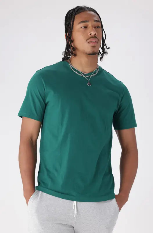 Men’s forest green short-sleeved t-shirt.