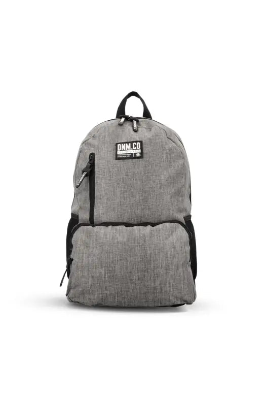 A gray fabric backpack with black zippers and trim.