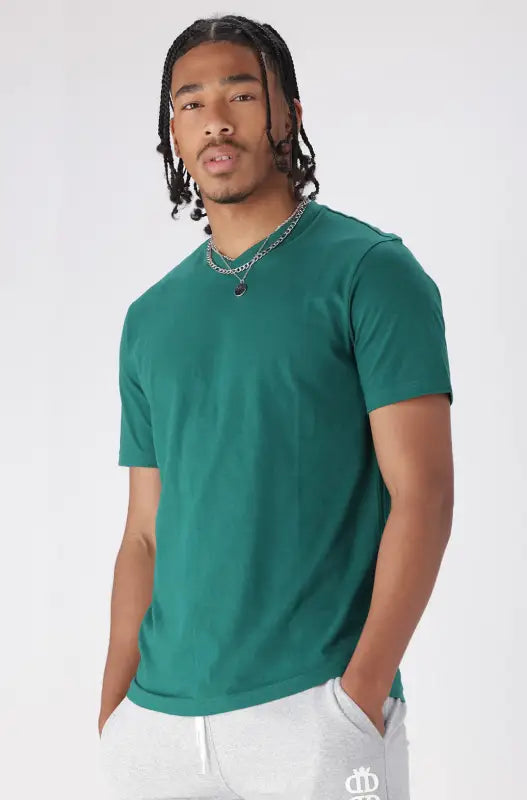 A short-sleeved, dark teal V-neck t-shirt.