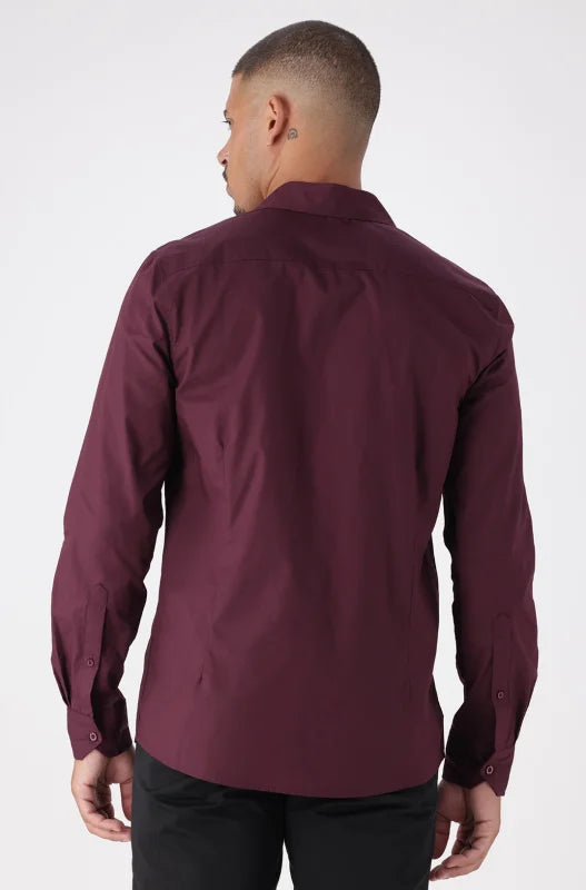 Men’s long-sleeve burgundy button-up shirt.
