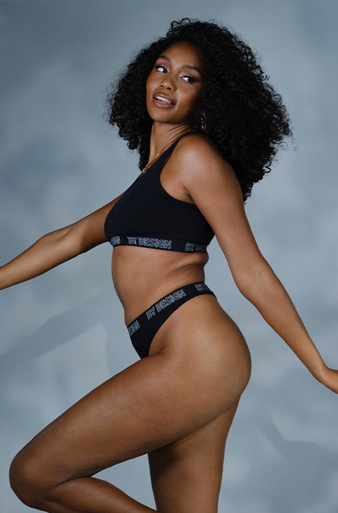 BY DESIGN BRANDED ELASTIC THONG