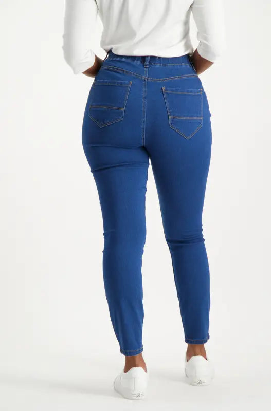 Blue skinny jeans with back pockets.