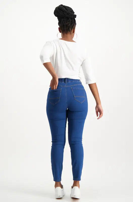 Women’s mid-rise blue skinny jeans.