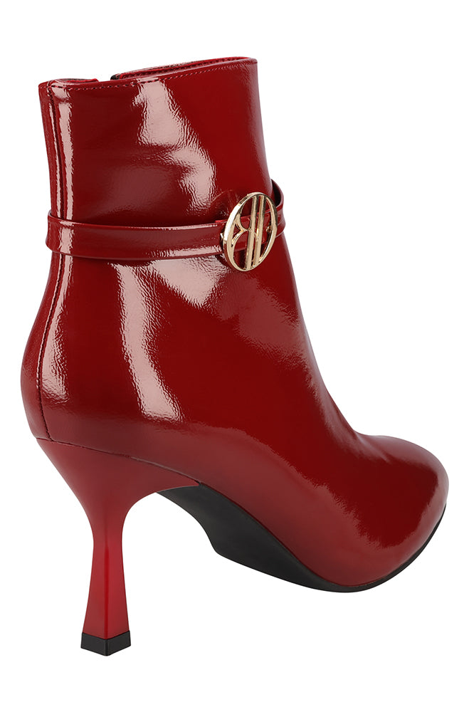 Zandi BD crinkled patent boot heel