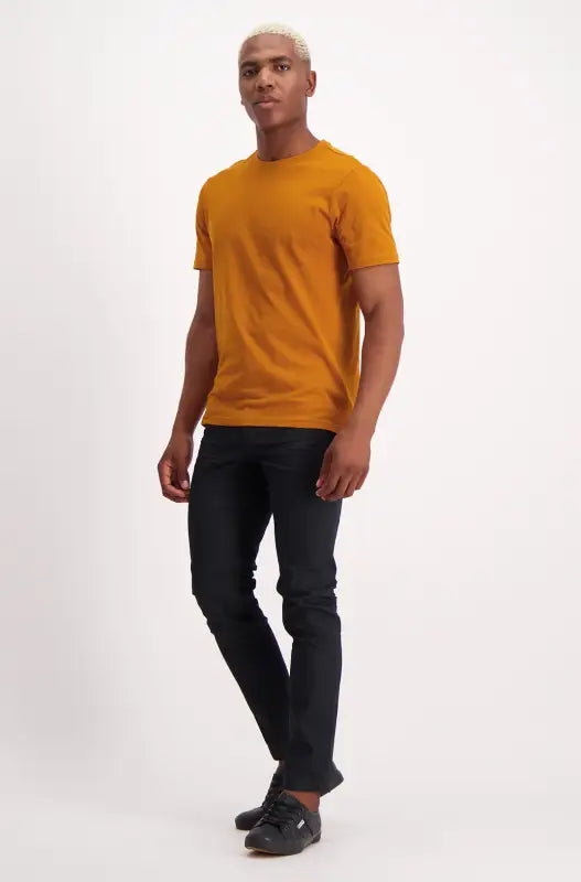 Men’s solid mustard yellow crewneck short-sleeve t-shirt.