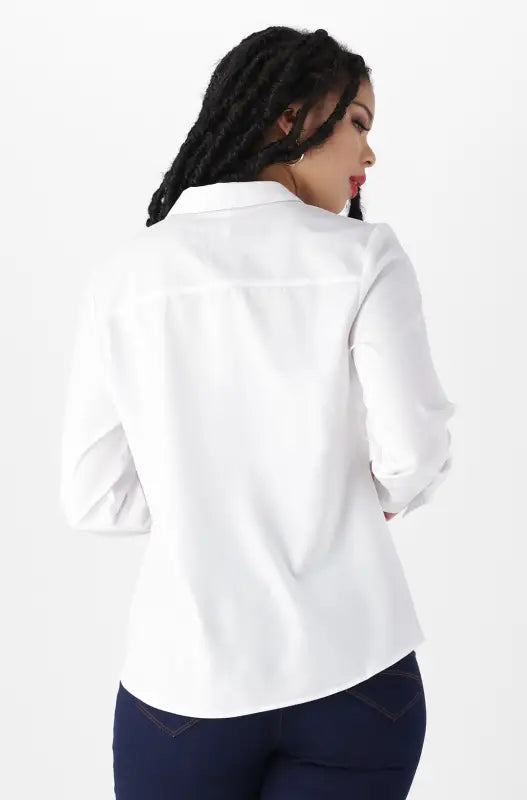 White long-sleeved button-down shirt with a collar.