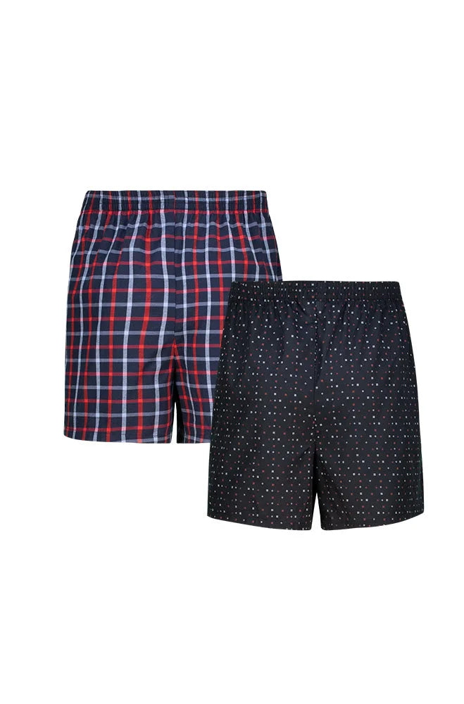 A two-pack of men’s woven boxer shorts, one with a red, white, and blue plaid pattern, and the other with white polka dots on a dark blue background.