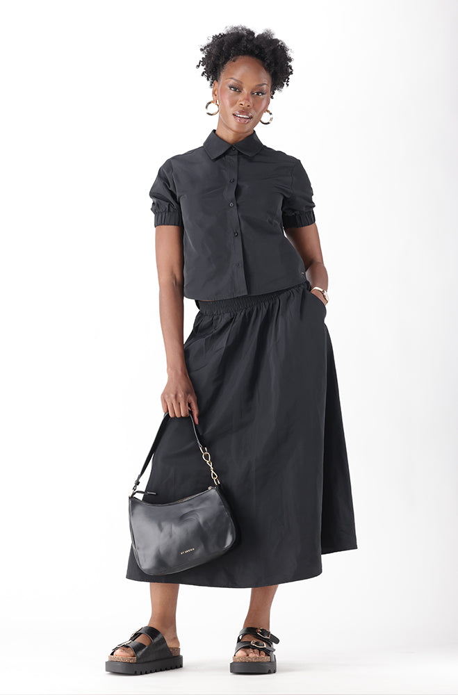 VANAIA FIT AND FLARE MIDI SKIRT