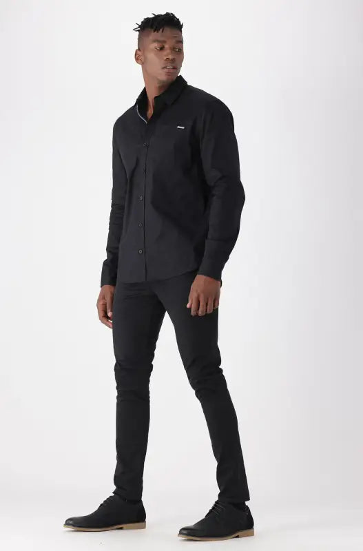 Men’s black long-sleeved button-up shirt with a band collar.