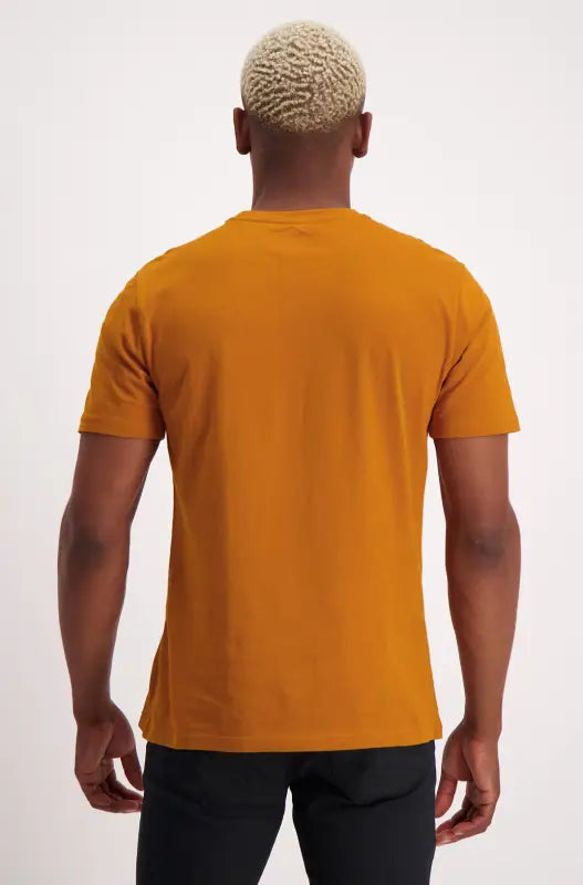 Men’s mustard yellow short-sleeved crew neck t-shirt.