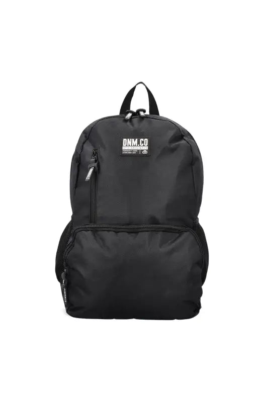 Black nylon backpack with a top handle and multiple zippered compartments.