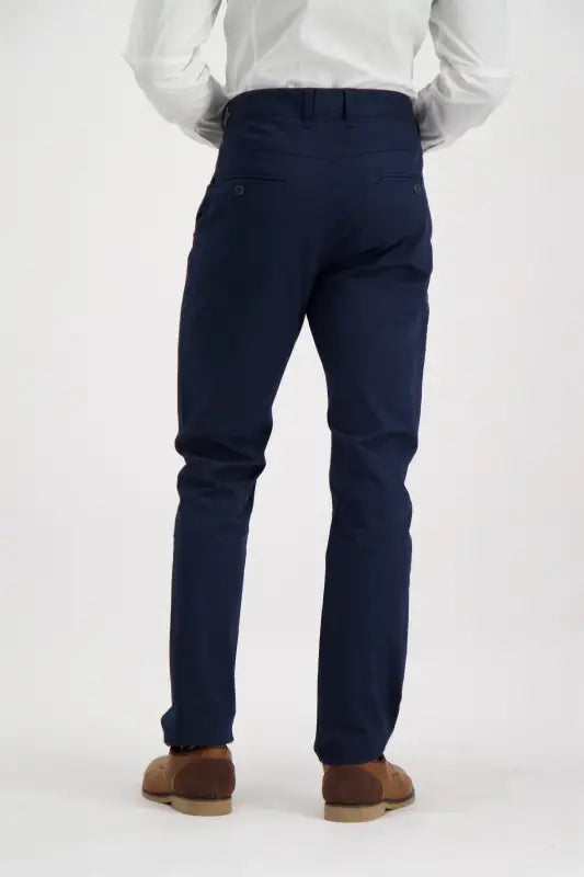 Men’s navy blue dress pants with brown suede shoes