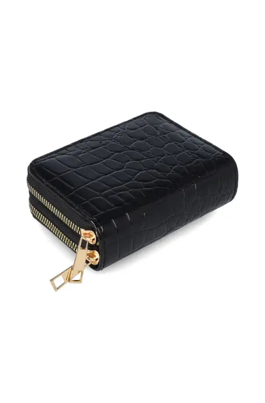 Black crocodile-embossed leather wallet with two gold-toned zippers.