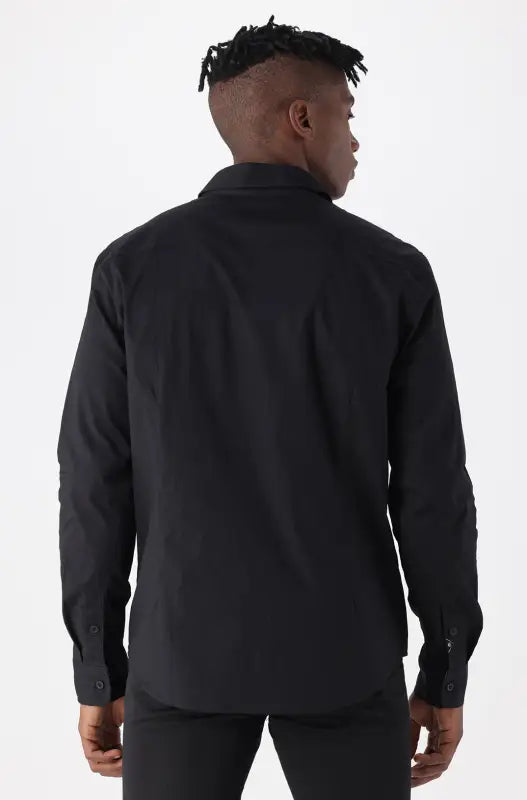Men’s black long-sleeve button-up shirt.