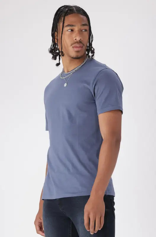 A short-sleeved blue t-shirt with a crew neck.