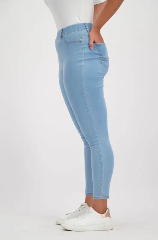 Light-wash blue skinny jeans.
