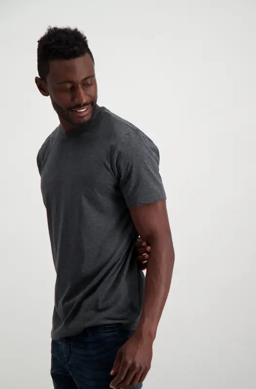 A dark gray short-sleeved t-shirt made from a solid, smooth fabric.