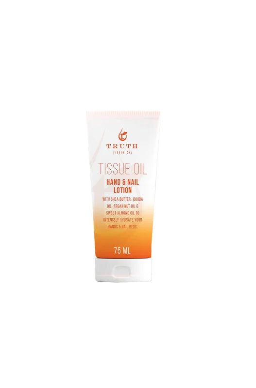 White and orange hand and nail lotion in a squeeze tube.