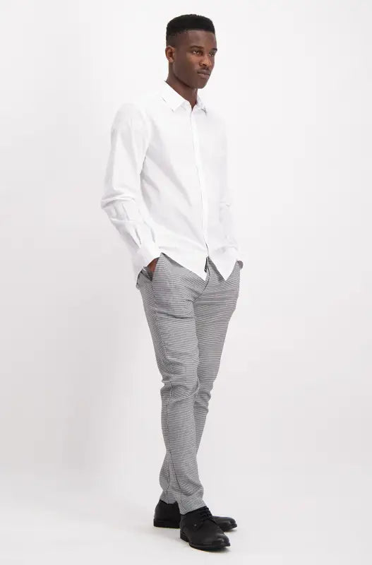 Men’s white long-sleeve dress shirt.