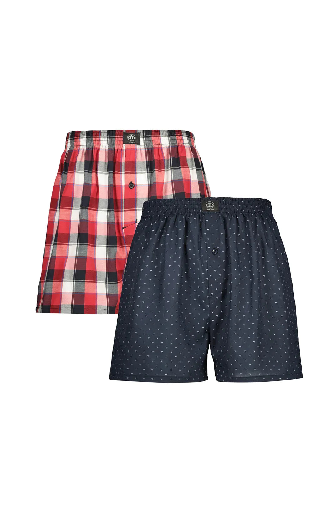 Two pairs of men’s woven boxers, one in red and black plaid, and the other in navy blue with white polka dots.