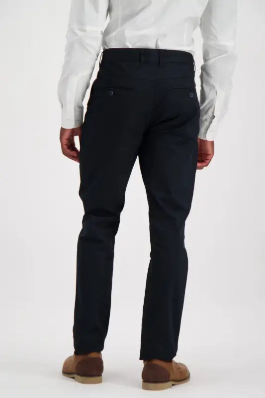Men’s dark blue dress pants with brown suede shoes