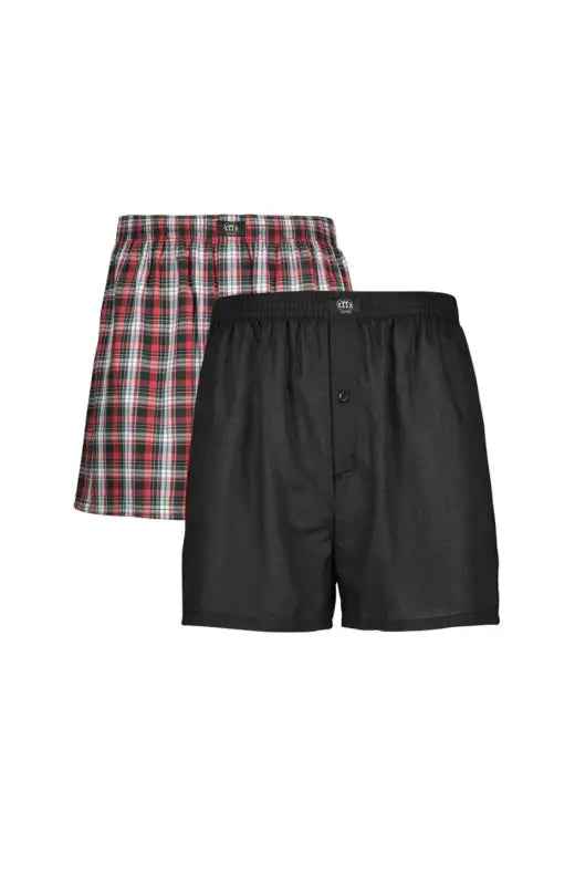 A two-pack of men’s woven boxers, one black and one red plaid.